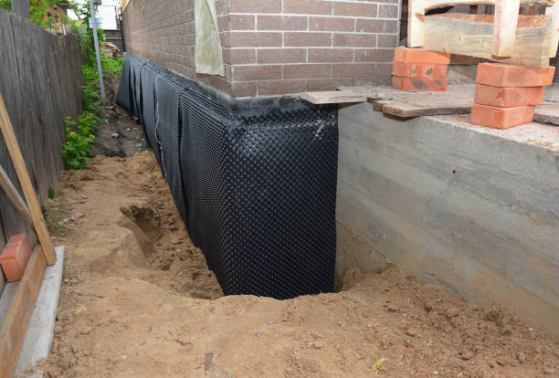 Happy homeowners after waterproofing job in Dickson